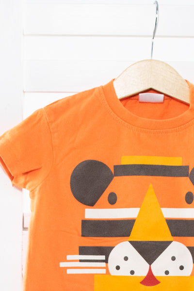 Свежа тениска в оранжево и апликация лъвче F&F/ 3-6м.